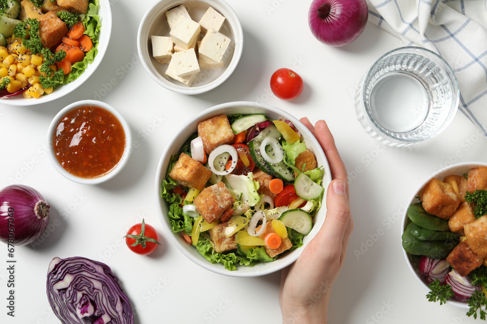 Fried tofu salad with vegetables and sauce top view Fried tofu salad with vegetables and sauce top view