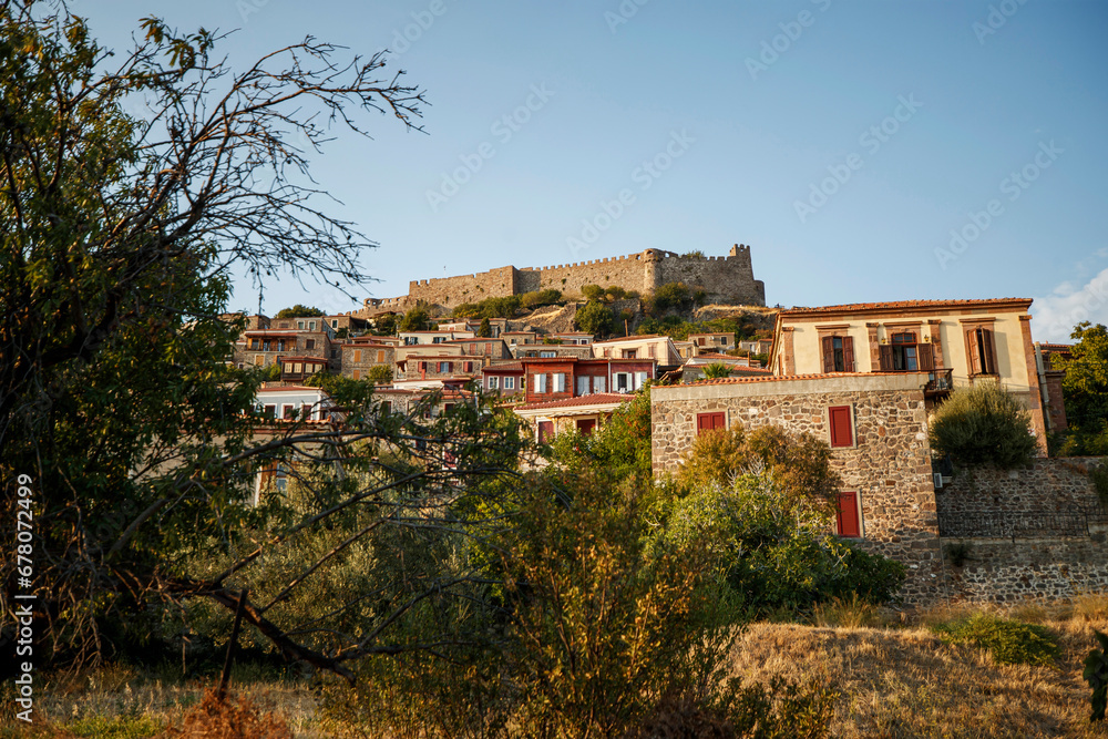 Traditional Greece. Lesvos island, view of town Molyvos (Mithymna) with old castle above Traditional Greece. Lesvos island, view of town Molyvos (Mithymna) with old castle above