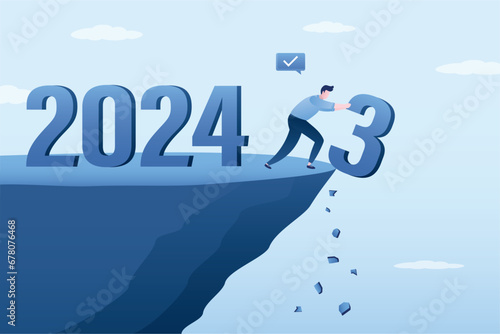 Happy man push number three off cliff into an abyss. Numbers 2024 on cliff. Symbol of starting and welcome New Year 2024. Hope for a successful and prosperous new year 2024.