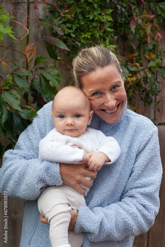 Portrait of mother with her 3 month old baby photo