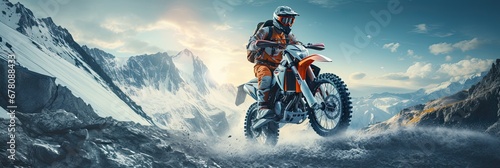 Person riding a motorcycle over snowy mountains and snow path photo