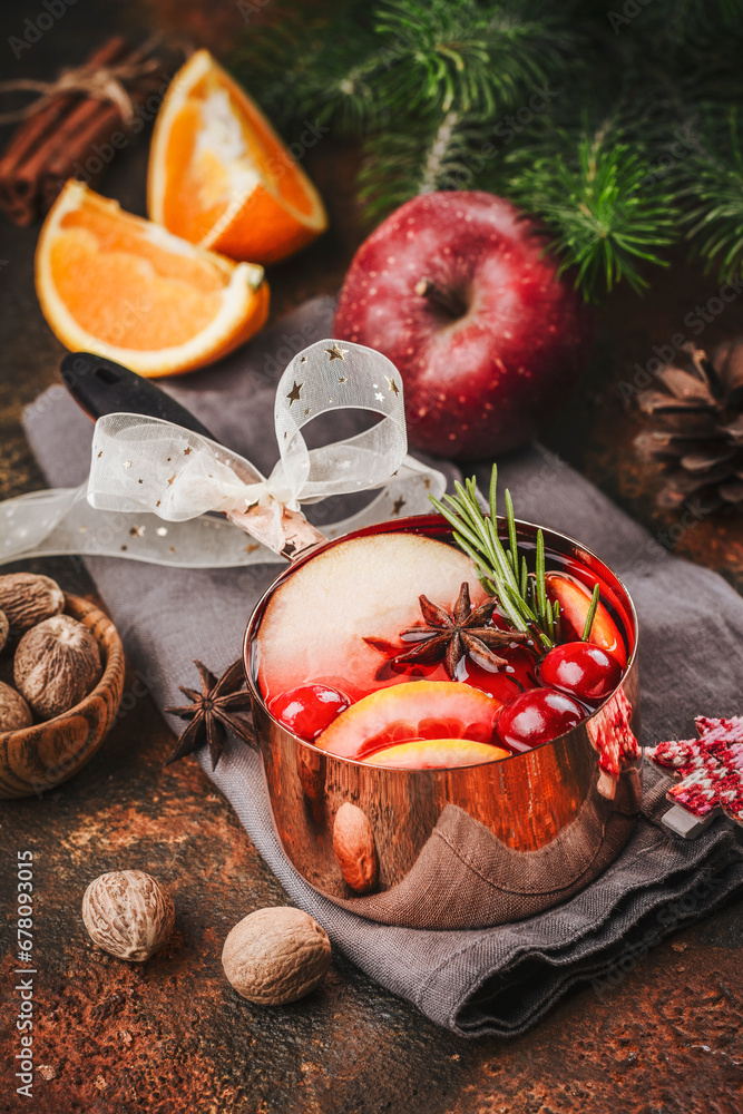 Hot mulled wine with fruits and spices. Autumn or winter warm drink Hot mulled wine with fruits and spices. Autumn or winter warm drink