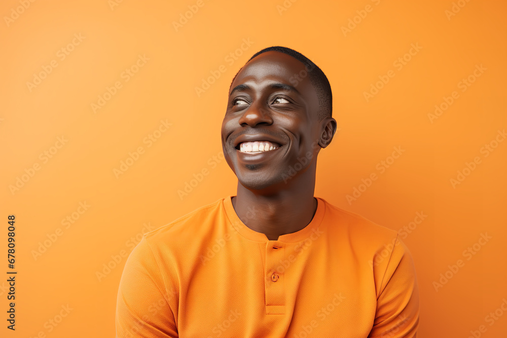 Medium shot portrait photography of a pleased man in his 30s against a light orange background Medium shot portrait photography of a pleased man in his 30s against a light orange background