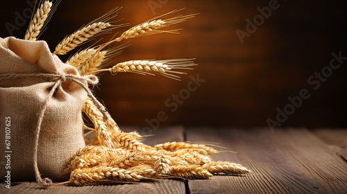 Wheat in a sack on a wooden background. Selective