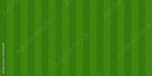 Wide background football field with striped grass
