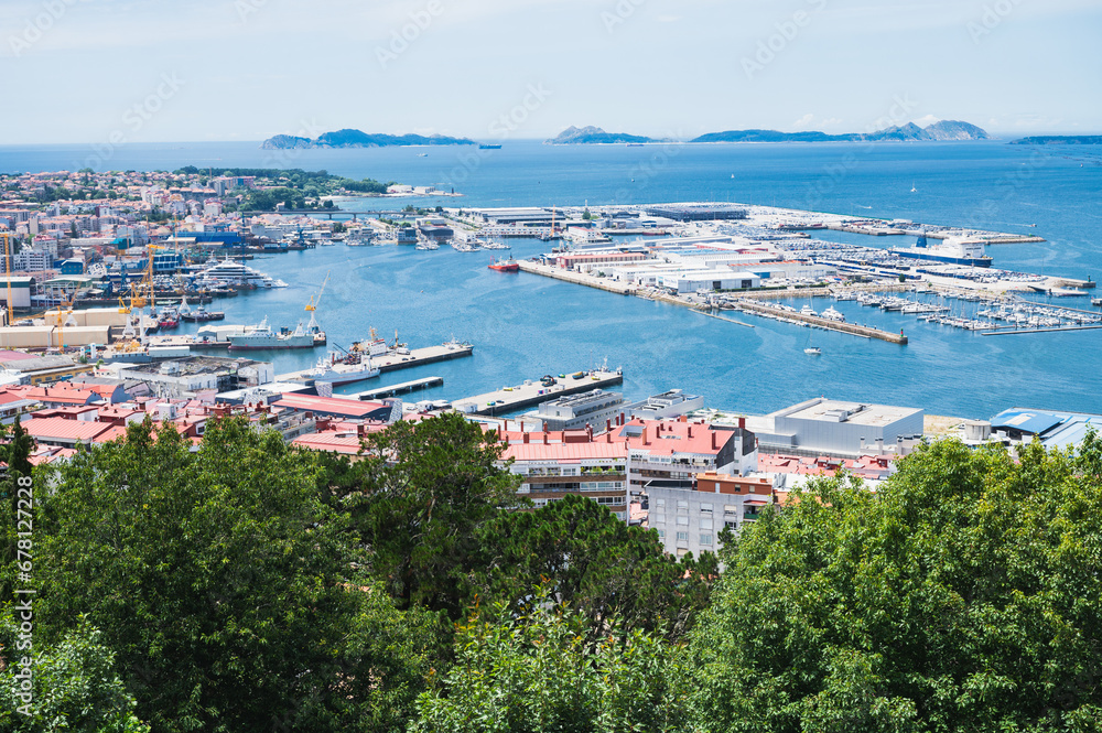 The view from the hill in Parque Monte del Castro, park located on a hill in Vigo, the biggest city in Galicia Region, in the North of Spain. View of the sea, harbour and docks, selective focus