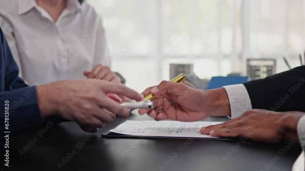 Business people selling, buying or mortgage and signing agreement paperwork for loan financial to buying apartment house properties. Business people selling, buying or mortgage and signing agreement paperwork for loan financial to buying apartment house properties.