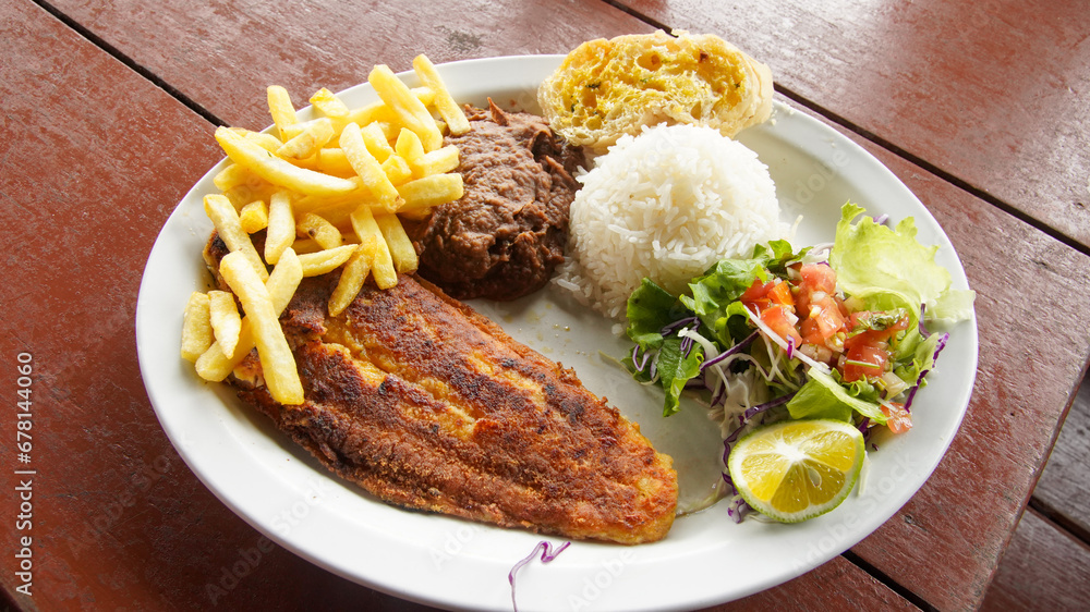 Costa Rican Grilled Fish Casado With Salad, Rice, Bread and French ...