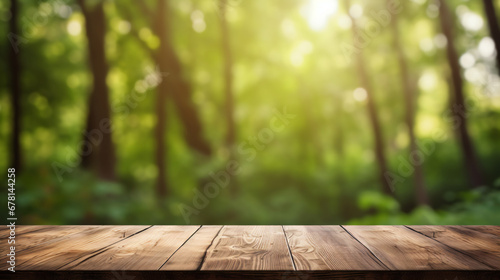 Wooden table with defocused forest background