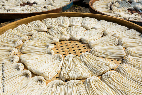 Close-up of traditional handmade noodle-making drying outdoors in Guanmiao, Tainan, Taiwan.
