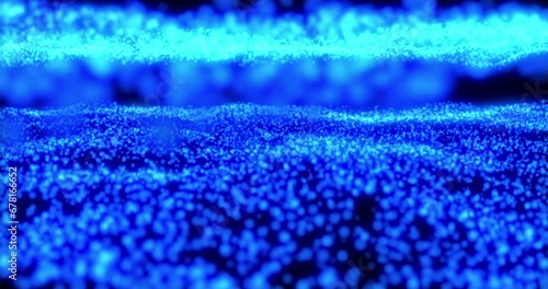 Particles, abstract background with blue floor particle stardust. Futuristic glittering wave movement flickering in space on black background.