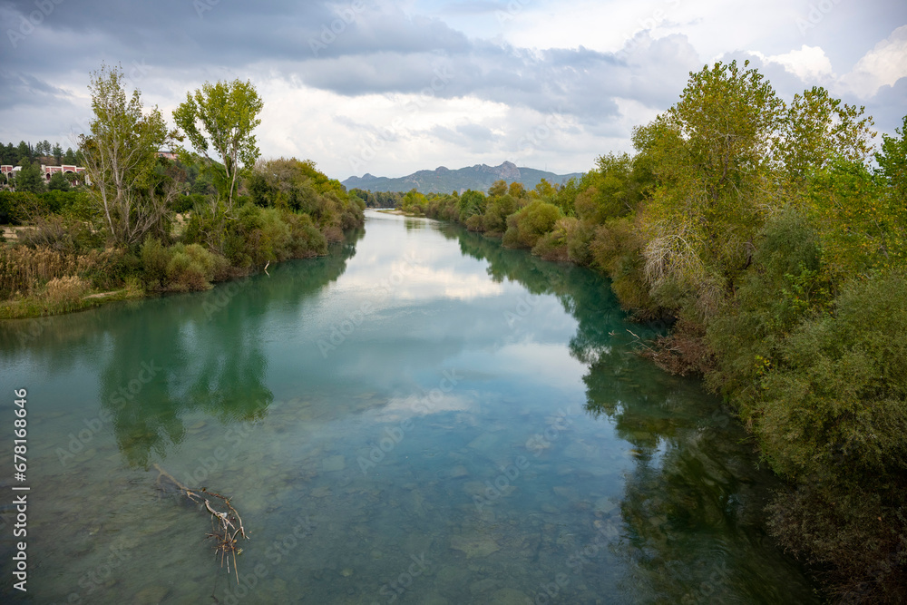Transparent waters of Kopru River (Köprüçay, ancient Eurymedon) with its emerald green colour in Koprulu Canyon (Köprülü Kanyon) National Park, Antalya, Turkey
