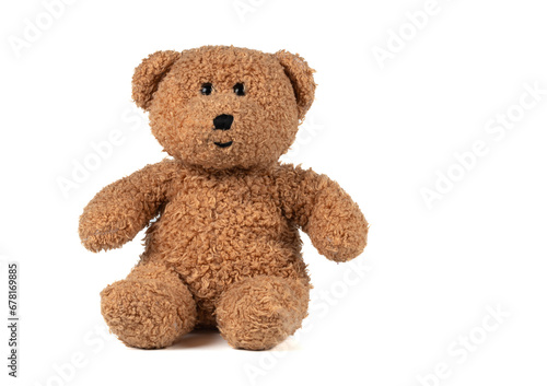 Toy fluffy vintage bear on a white background. Brown teddy bear isolated.