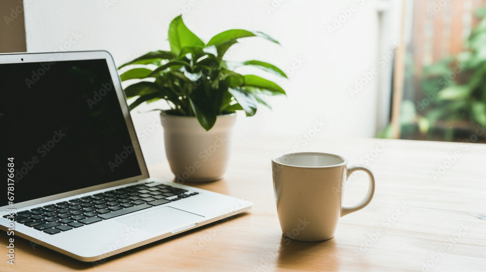 Laptop and coffee cup on wooden table in office, stock photo. Laptop and coffee cup on wooden table in office, stock photo.