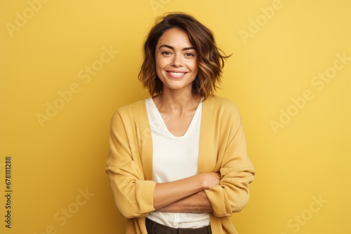 Portrait of a satisfied woman in her 30s wearing a chic cardigan against a pastel yellow background. AI Generation