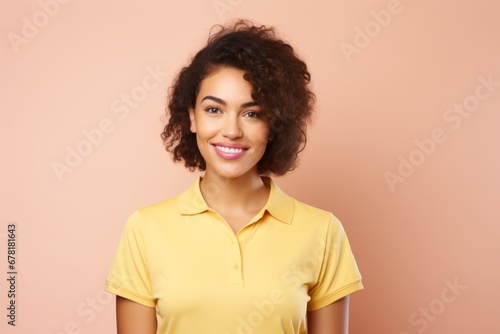 Portrait of a smiling woman in her 20s donning a classy polo shirt against a pastel yellow background. AI Generation