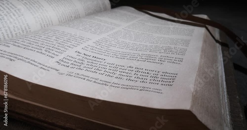 Bible macro slide over page text do not worry  Book of Matthew night atmosphere