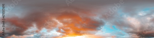 Dramatic sunset sky panorama with bright glowing red pink Cumulus clouds. HDR 360 seamless spherical panorama. Sky dome in 3D, sky replacement for aerial drone panoramas. Weather and climate change.