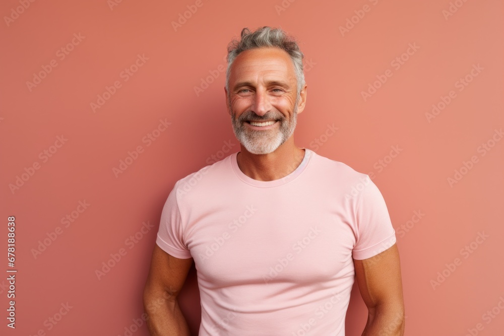 Portrait of a cheerful man in his 50s donning a trendy cropped top against a pastel brown background. AI Generation Portrait of a cheerful man in his 50s donning a trendy cropped top against a pastel brown background. AI Generation