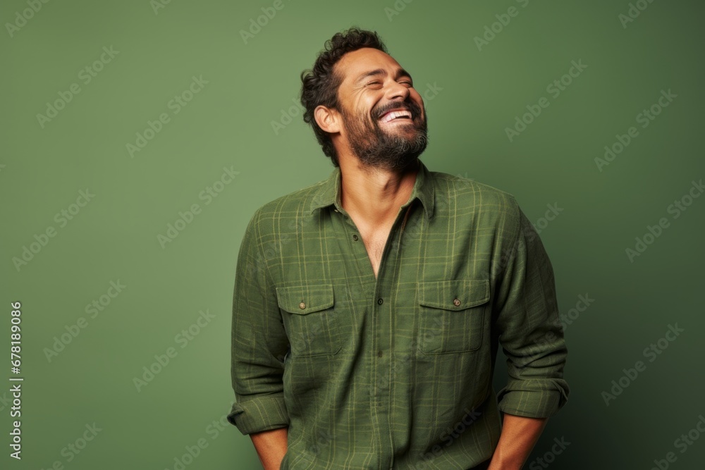 Portrait of a joyful man in his 30s wearing a comfy flannel shirt against a soft green background. AI Generation Portrait of a joyful man in his 30s wearing a comfy flannel shirt against a soft green background. AI Generation
