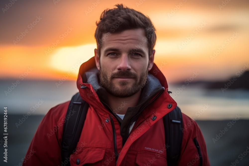 Portrait of a content man in his 30s donning a durable down jacket against a vibrant beach sunset background. AI Generation Portrait of a content man in his 30s donning a durable down jacket against a vibrant beach sunset background. AI Generation
