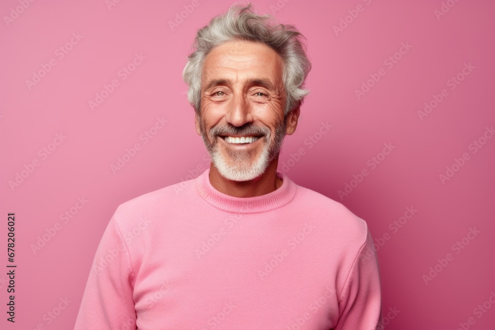 Portrait of a happy man in his 70s wearing a thermal fleece pullover against a pastel or soft colors background. AI Generation Portrait of a happy man in his 70s wearing a thermal fleece pullover against a pastel or soft colors background. AI Generation
