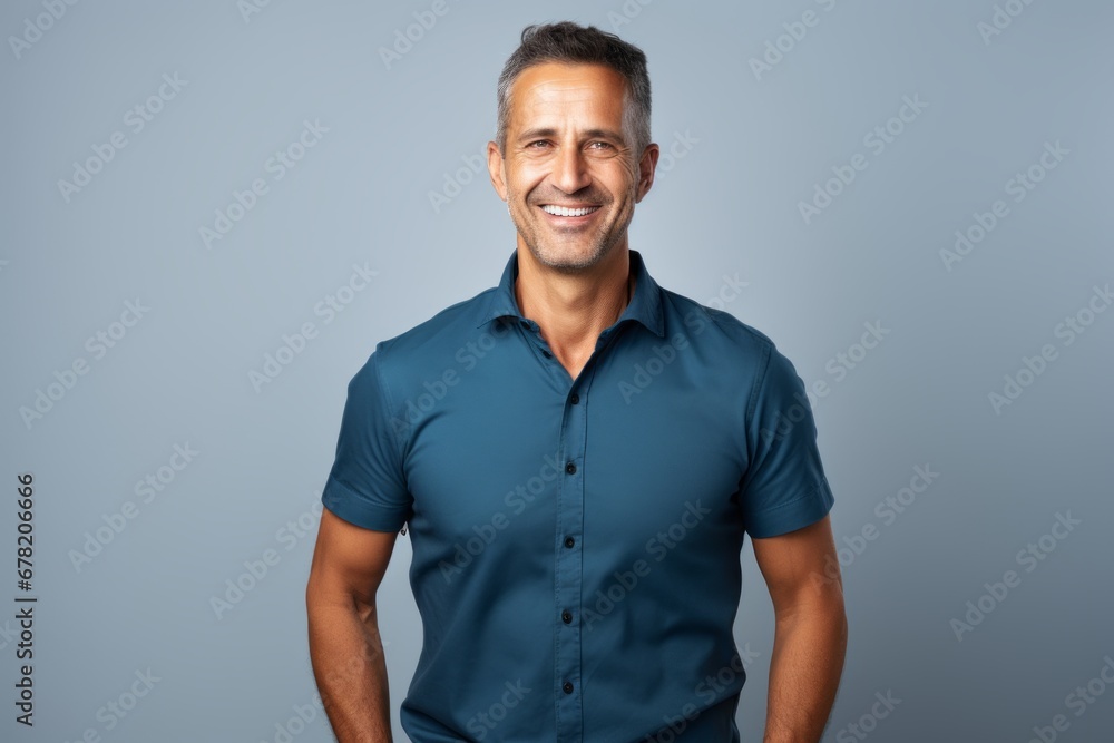 Portrait of a happy man in his 40s wearing a sporty polo shirt against a minimalist or empty room background. AI Generation Portrait of a happy man in his 40s wearing a sporty polo shirt against a minimalist or empty room background. AI Generation