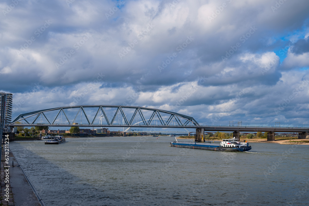 The Waal near Nijmegen/Netherlands with cargo ships on the river