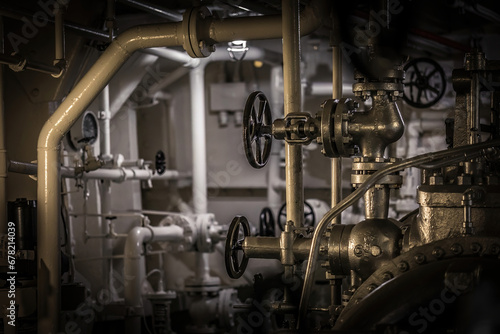 Engine room with steam pipes.