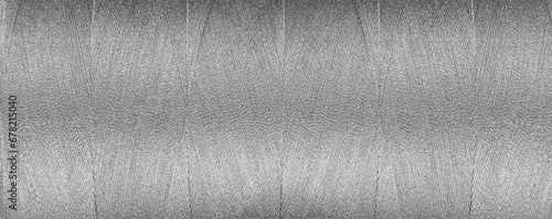 texture of thread for a sewing machine gray colors on a white background photo