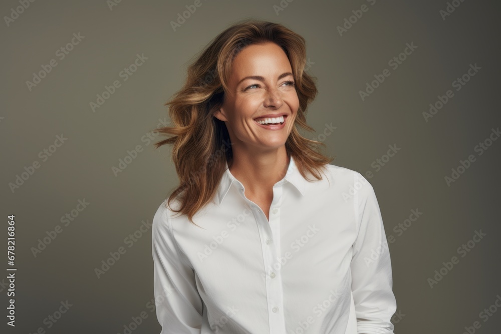 Portrait of a happy woman in her 40s wearing a classic white shirt against a plain white digital canvas. AI Generation Portrait of a happy woman in her 40s wearing a classic white shirt against a plain white digital canvas. AI Generation