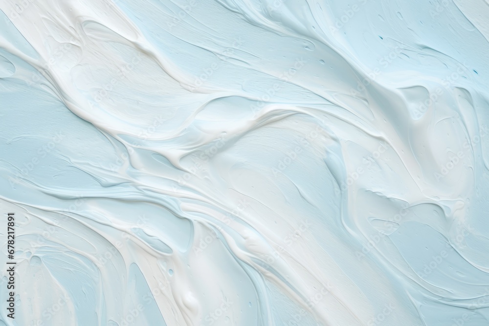 Smudged cream texture on pastel blue backdrop Smudged cream texture on pastel blue backdrop