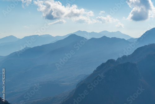 blue sky over valley among albania theth national park and mountains