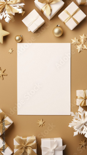 Christmas greeting card mockup with decorations, gift boxes and snowflakes on brown background. Flat lay, top view, copy space.