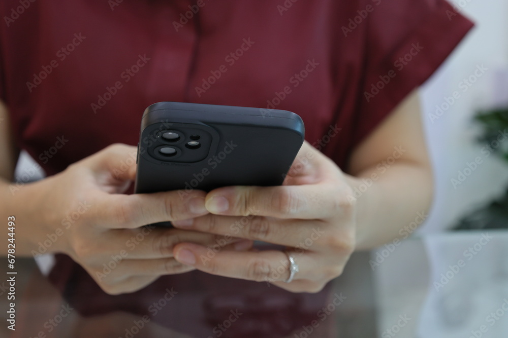 Fototapeta premium person using phone
