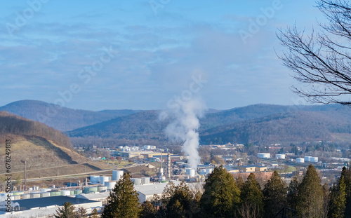 Bradford, Pennsylvania overlooking oil refinery, late autumn sunny day, global worming pollution theme