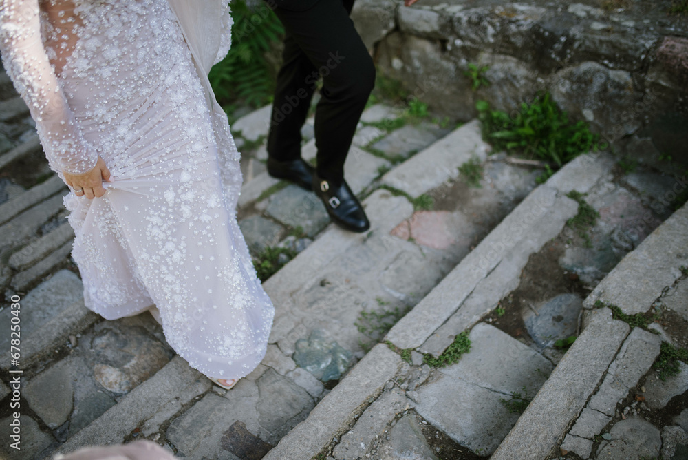 Bride and groom. Just married. Happy couple walking away. Bride and groom. Just married. Happy couple walking away.