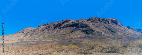A view of arid landscapes and mountain scenery in the Naukluft Mountain Zebra Park in Namibia in the dry season