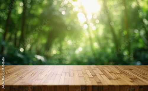 Wooden board empty table in front of blurred background. Perspective brown wood over blur trees in forest - can be used for display or montage or mock up your products. your products.