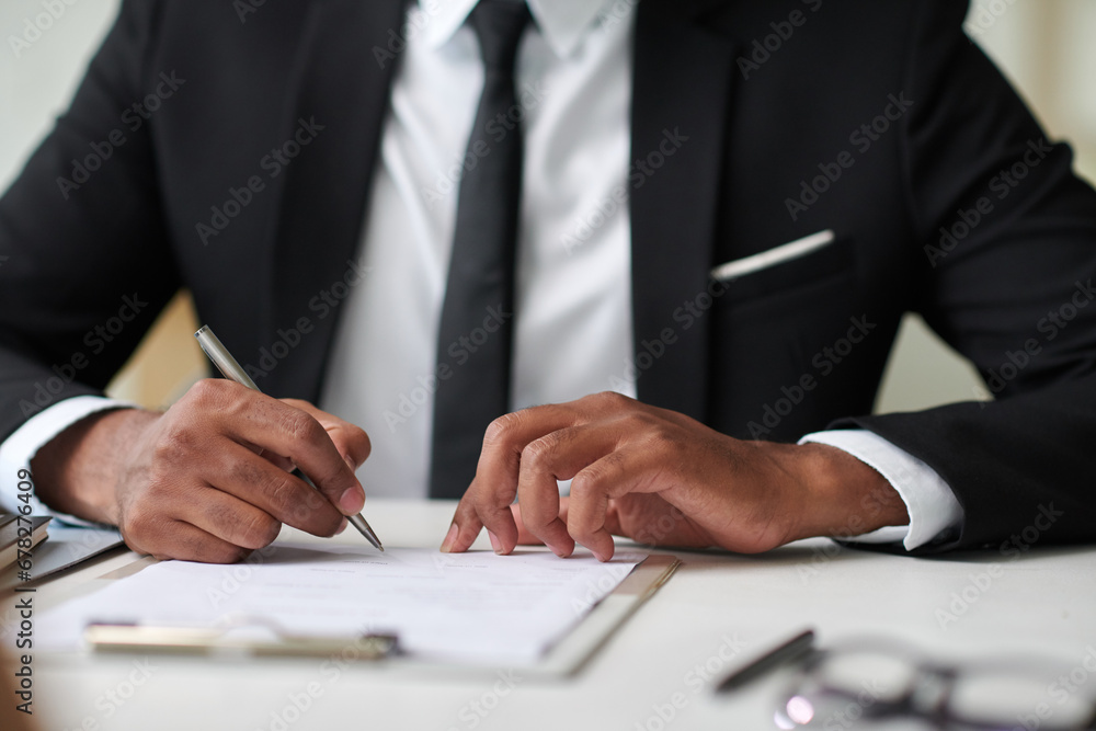 Job candidate signing contract after job interview with hr manager Job candidate signing contract after job interview with hr manager