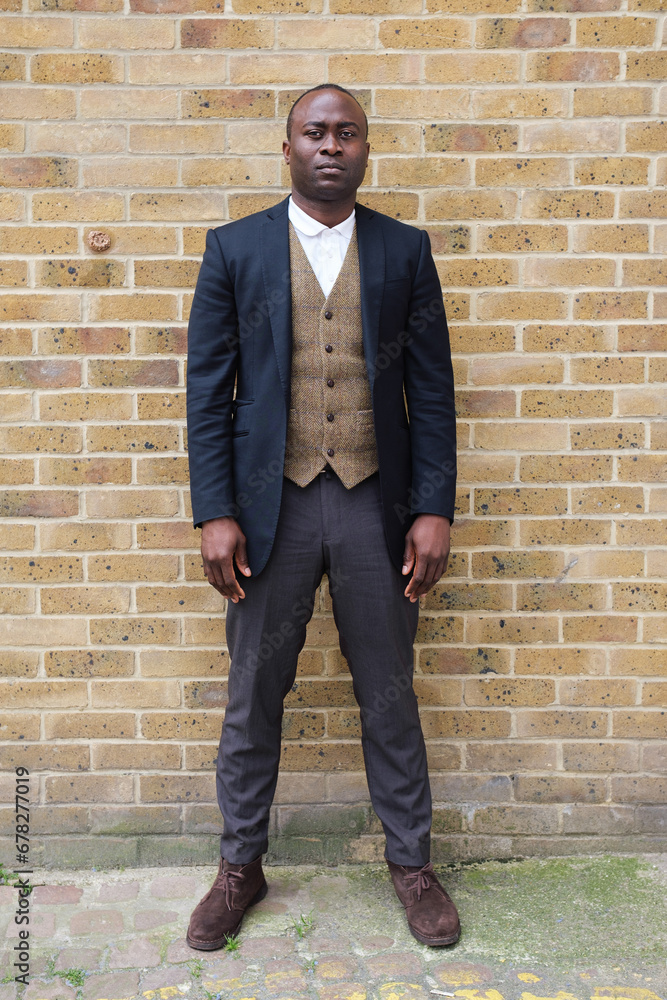 Businessman Strikes a Full-Length Pose for the Camera Businessman Strikes a Full-Length Pose for the Camera