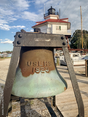 Brass bell on display at the Drum Point Lighthouse in Solomon's Island, Maryland