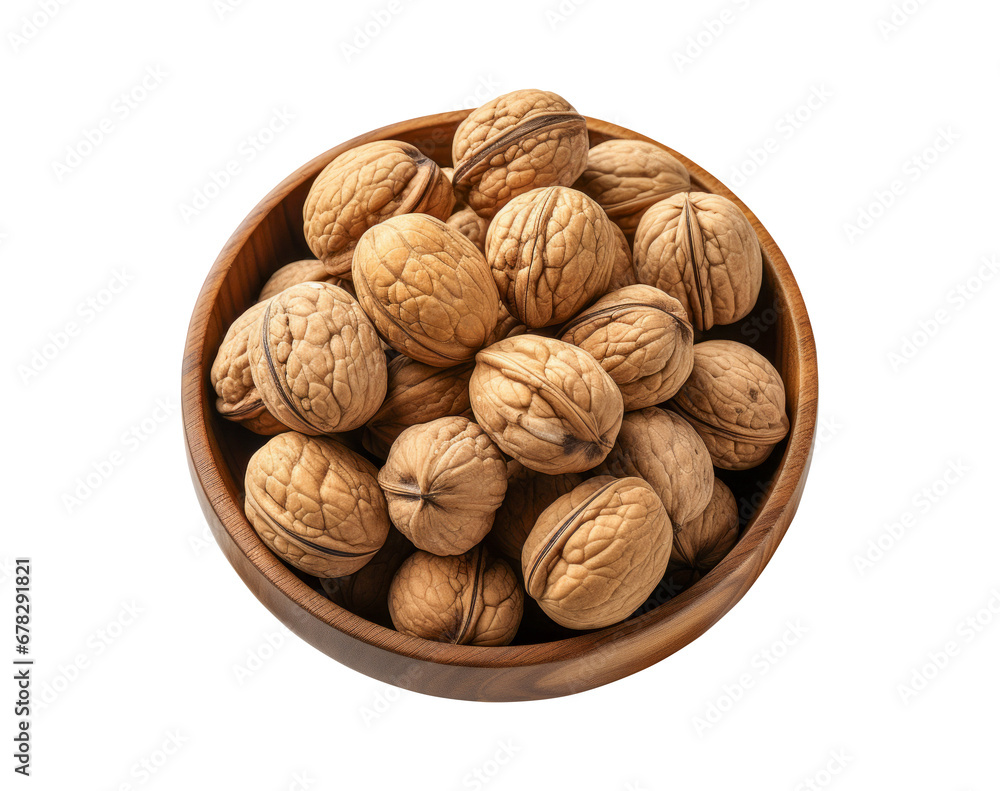 Walnuts in wooden bowl isolated on white background. Top view. Walnuts in wooden bowl isolated on white background. Top view.