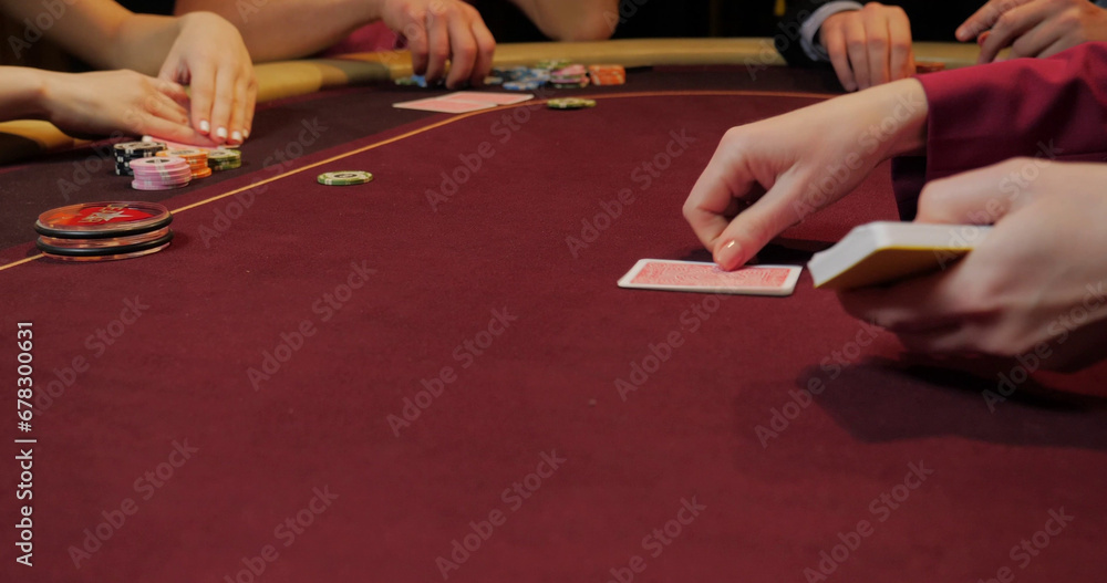 Poker chips on the table. Close-up of hands. Poker chips on the table. Close-up of hands.