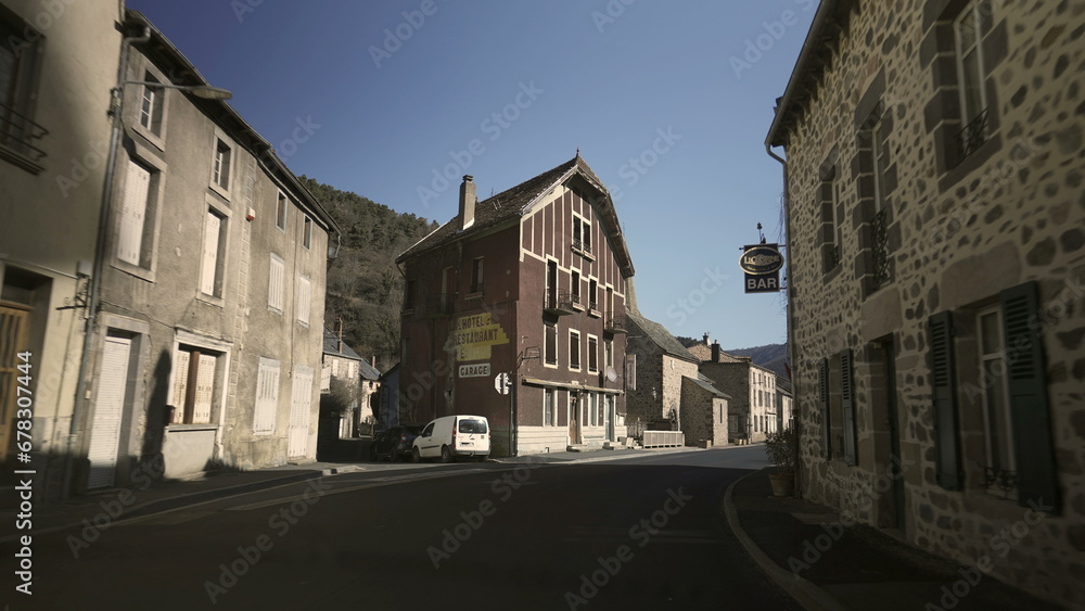Circa January 2022 France - Passenger perspective driving through a French small town