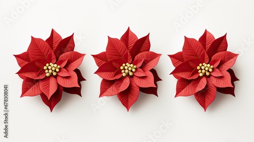  three red paper poinsettias on a white background with a gold bead in the center of the poinsettia and the center of the poinsettia.
