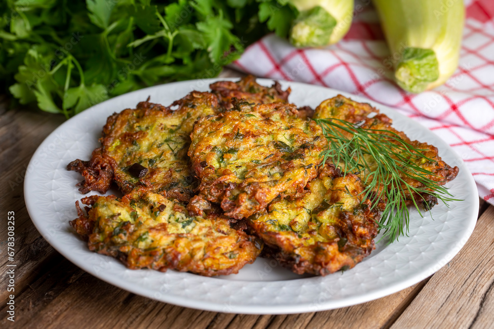 Mucver, Turkish traditional food. (Turkish cuisine) Homemade Food with Zucchini. Mucver, Turkish traditional food. (Turkish cuisine) Homemade Food with Zucchini.