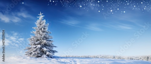 A single pine tree under a night sky filled with stars on a serene snowy landscape © artem