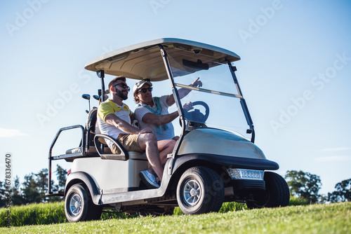 Men playing golf