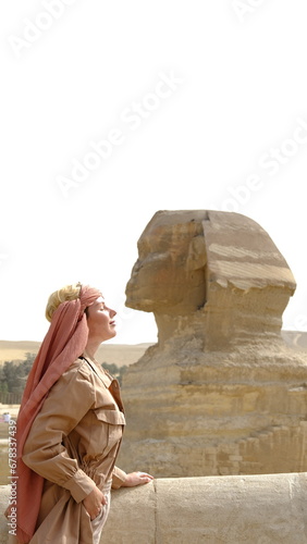 Woman tourist  a front of Great Sphinx of Giza pyramid in Egypt travel photography 
